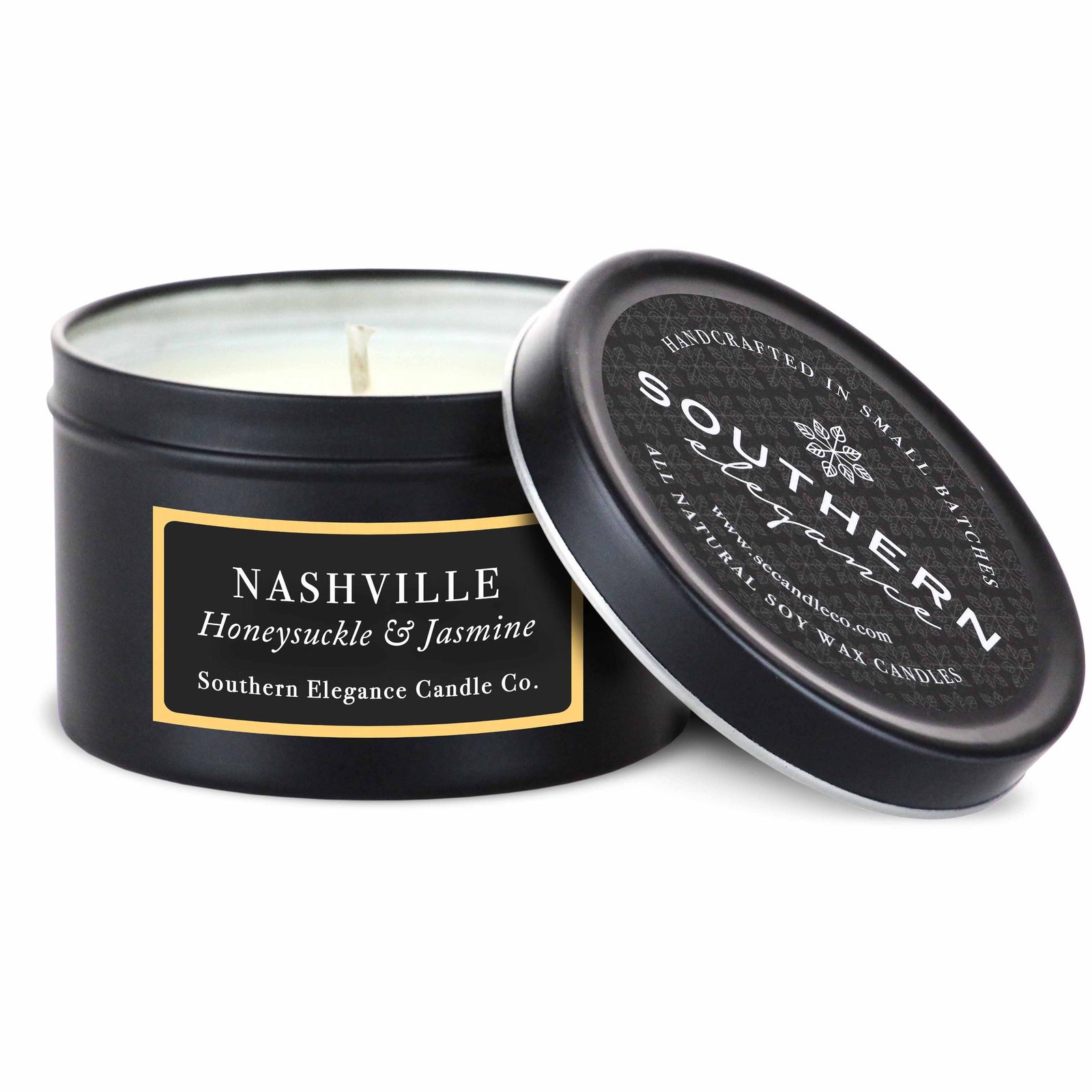 A black travel tin candle with a label that reads 'NASHVILLE Honeysuckle & Jasmine' and the brand 'Southern Elegance Candle Co.'.